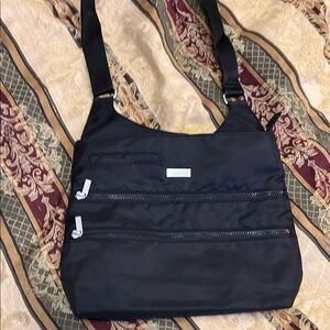 🔥Sleek Black Crossbody Bag with Adjustable Strap and Compact Design